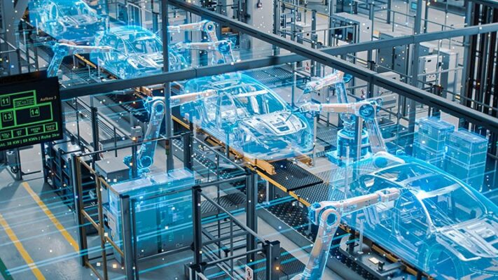 A car assembly line integrates IT and OT, with robotic arms working in harmony and holographic overlays depicting cars in various stages of assembly.