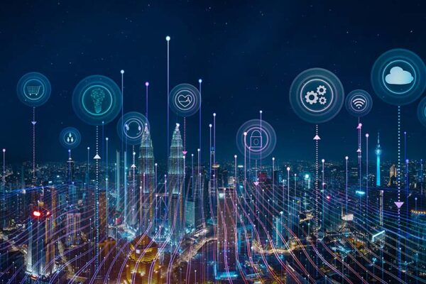 A city skyline at night with digital icons and lines overlaying the buildings.