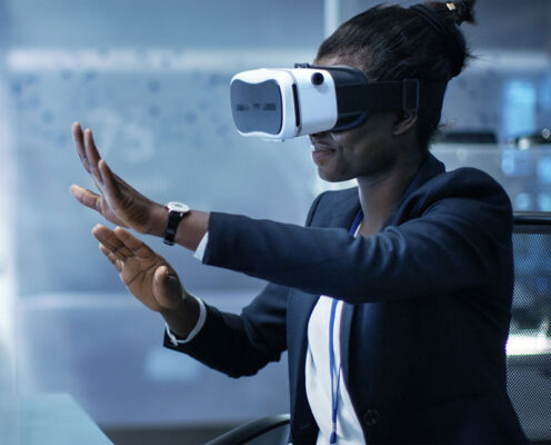 An engineer or developer wearing a virtual reality headset.