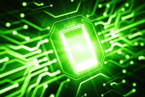 A glowing battery icon centered on a digital green circuit board background.