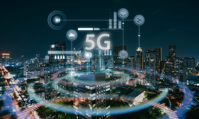 A city skyline at night is overlaid with digital technology graphics and a prominent "5G" symbol, illustrating that 5G technology defines advanced communication.