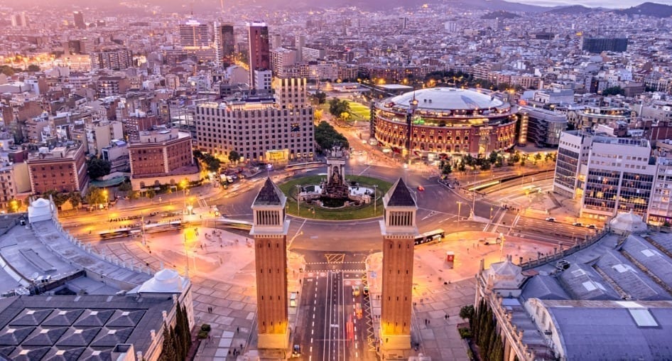 Plaza España in Barcelona, Spain, at dusk.