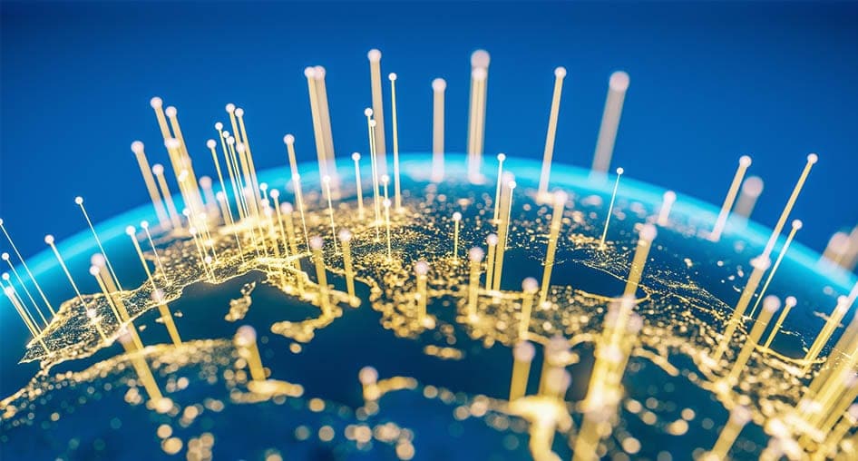 A view of Earth with connectivity lines like beams of light emanating from it.