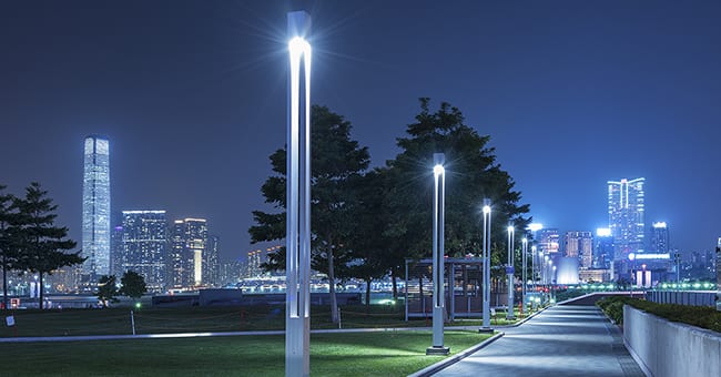 Smart street lighting in a city at night.