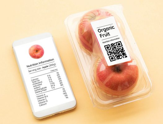 Organic apples in smart packaging with a QR Code.