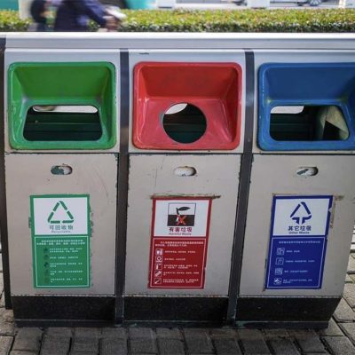 Trash and recycling receptacles.