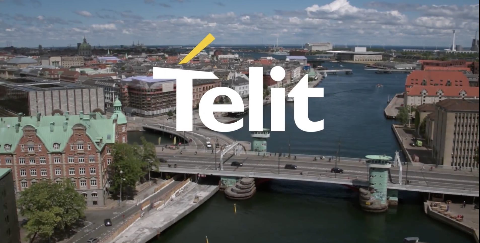 A city with a bridge and the word telit.