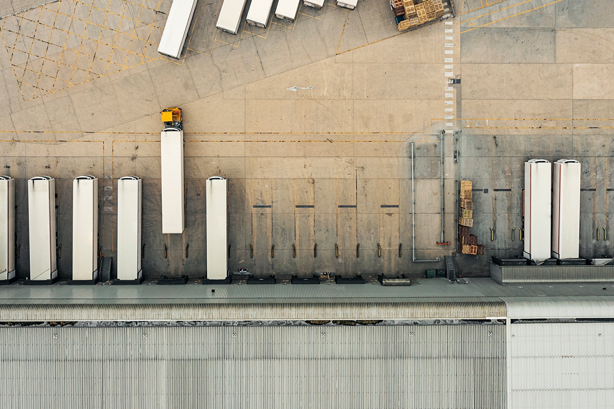 An aerial view of a large warehouse utilized for smart manufacturing.