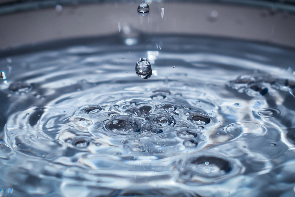 A close up of water droplets in a bowl.