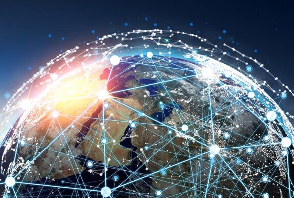 A view of Earth from space features a network of interconnected lines and nodes overlaying the planet, illustrating global digital connectivity enhanced by the C-band spectrum.
