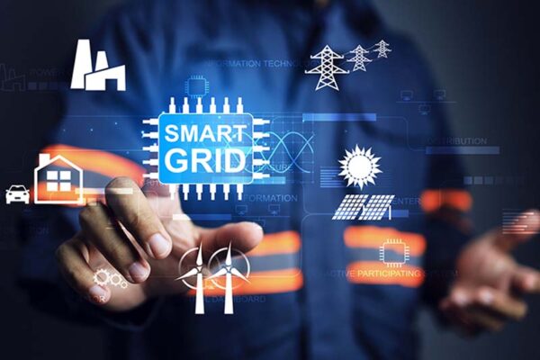 A person in work clothes interacts with virtual icons including power plants, solar panels, wind turbines, and electric grids.