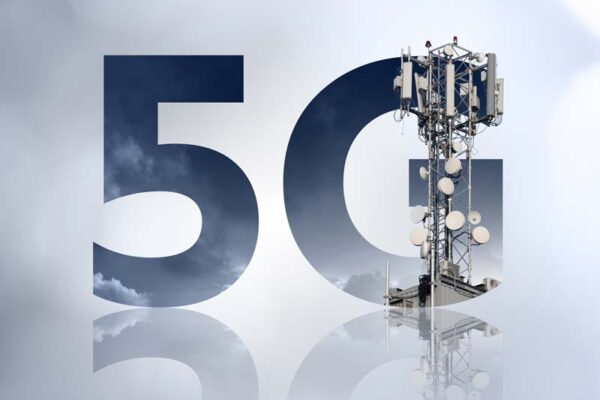 A cell tower with antennas, partially overlaid by the text "5G" on a cloudy background.