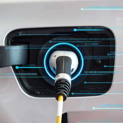 EV charger with data visuals superimposed above it.