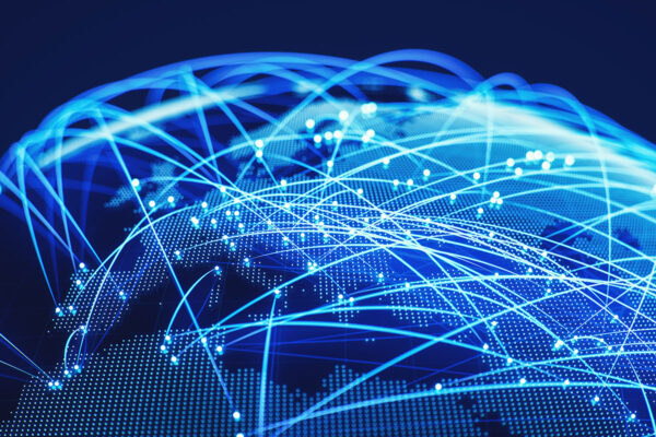 A globe with lines connecting and crisscrossing. Global roaming and eUICC can work together to future-proof your IoT deployment.