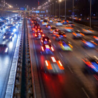 Motion blur of vehicles driving on a highway.