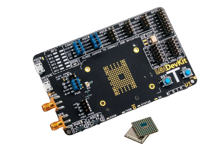 A small board with a chip from the Cinterion® LGA DevKit Family and a coin next to it.