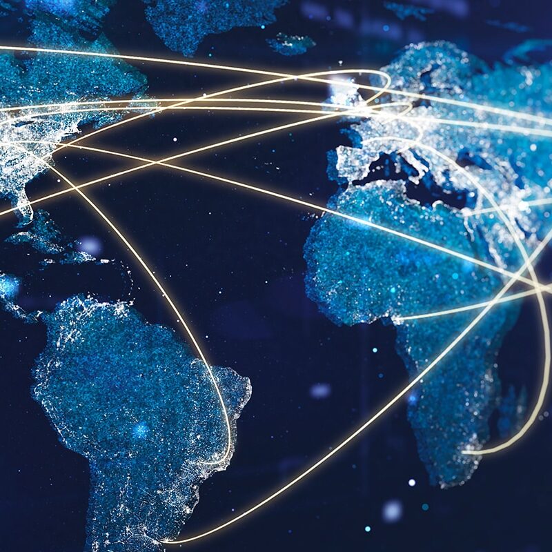 Map showing cities across the blobe connected by data lines.