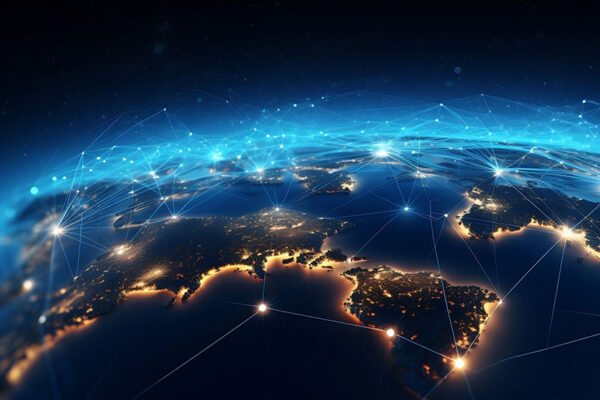A view of a continent at night from space, with illuminated cities and glowing lines connecting various points.