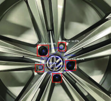 AI detecting defects on a hubcap. 