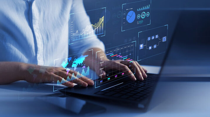 A user viewing data analytics on a virtual display.