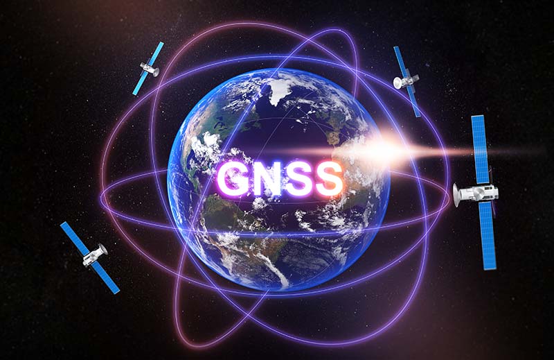 An illustration showing the earth, with GNSS written across it, surrounded by satellites.