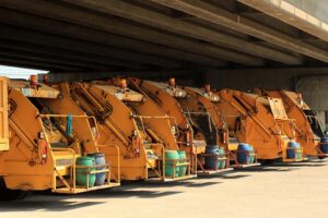 A fleet of garbage trucks.