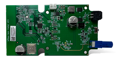 A green circuit board with a number of electronic components.