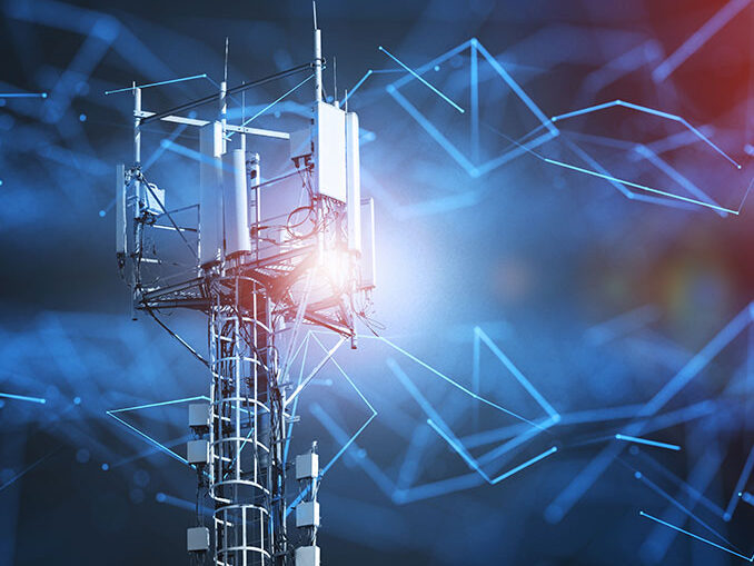 An illuminated cell tower with blue geometric lines and shapes in the background.