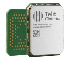 Close-up of a Telit Cinterion electronic module with visible IMEI number 123456789012345 and model ME310G1-W2, featuring a QR code and circuit patterns on a green board.