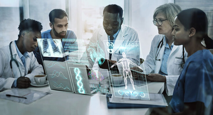 Doctors examining digital medical data on holographic screens during a meeting, an example of 5G in connected health care.