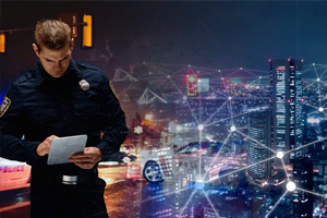 A police officer reads a document while standing in front of a cityscape at night, with digital network lines and glowing dots overlaying the scene.