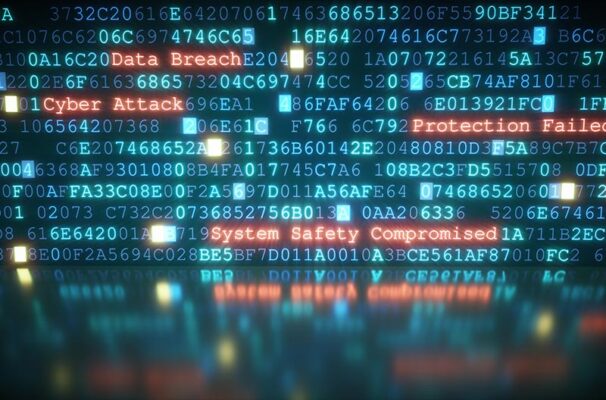A digital screen displays code with highlighted phrases: "Data Breach," "Cyber Attack," "Protection Failed," and "System Safety Compromised." 