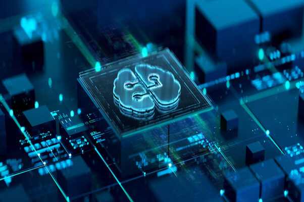 A computer chip with a glowing brain icon representing edge AI sits on a circuit board.