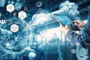 A person in a suit uses a tablet interface with digital icons, overseeing robotic arms in a high-tech industrial environment.