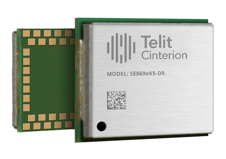 A Telit Cinterion SE869eK5-DR electronic module with a QR code, branding, and model number visible on the metal casing.