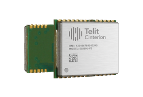 A Telit Cinterion electronic module with visible circuit board and labeled metallic cover showing IMEI, model number, and a QR code.