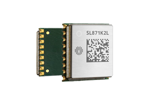 A small electronic chip module with gold connectors and a metal shield marked "SL871K2L" and a QR code.