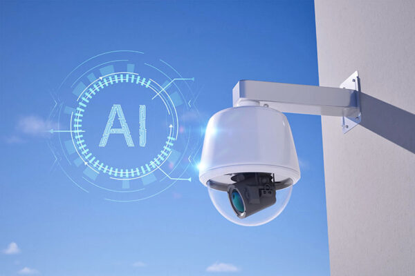 A digital AI graphic next to a wall-mounted security camera covered by a clear dome.