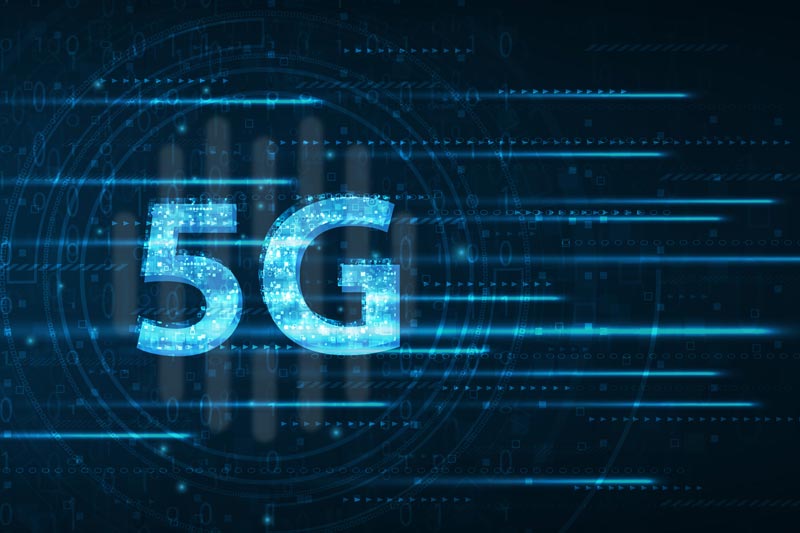 The image shows a digital illustration of the text "5G" with blue light effects and fast-moving lines, symbolizing high-speed wireless technology.