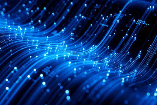 Blue glowing lines and dots form a flowing wave pattern, representing high-resolution video streaming.