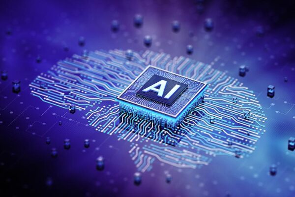 A computer chip labeled "AI" sits at the center of a digital circuit board shaped like a brain, symbolizing artificial intelligence technology.