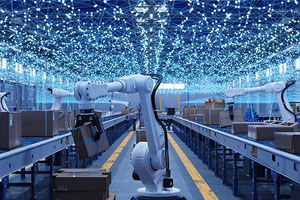 Robotic arms move boxes on conveyor belts in a spacious, brightly lit warehouse with a ceiling covered in small lights.