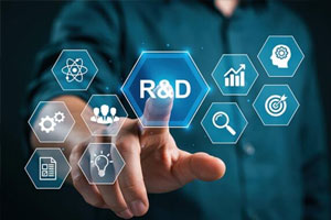 A person touches a transparent screen with R&D and related research icons, including graphs, target, magnifying glass, light bulb, and people, representing technology and innovation.