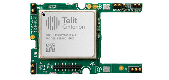 Rectangular green circuit board featuring a Telit Cinterion module labeled “MODEL: LE910C1-EUX” with various connectors and electronic components.